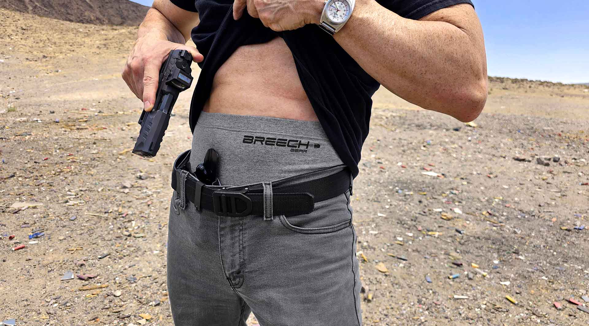Drawing a Walther PDP 9-millimeter pistol while wearing Breech Gear boxer briefs in the desert. 
